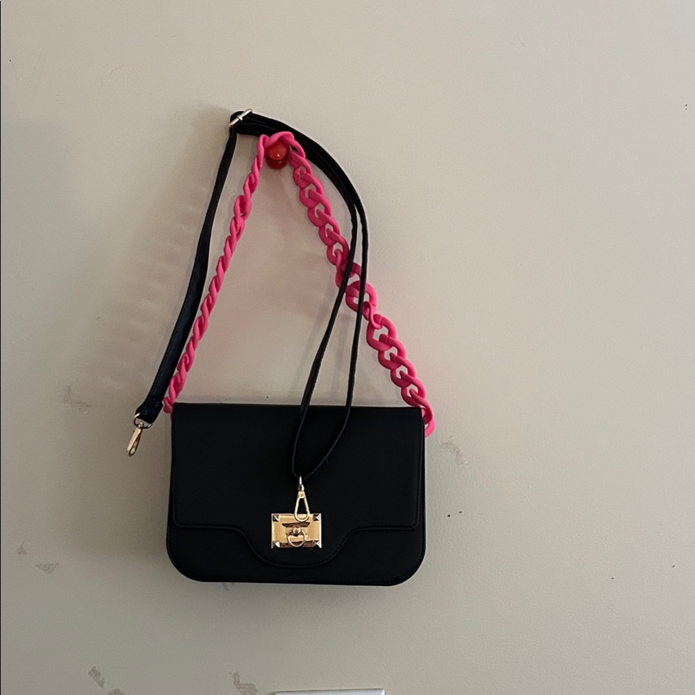 Chic Black Crossbody Bag with Pink Chain Strap